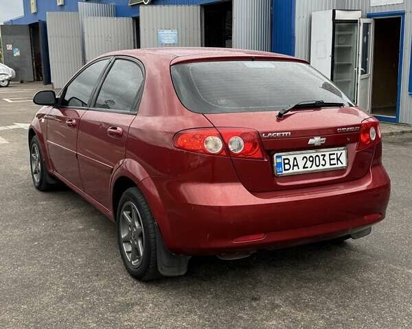 Красный Шевроле Лачетти, объемом двигателя 1.4 л и пробегом 160 тыс. км за 4450 $, фото 6 на Automoto.ua