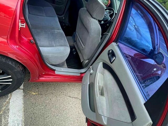 Червоний Шевроле Лачетті, об'ємом двигуна 1.8 л та пробігом 180 тис. км за 4000 $, фото 4 на Automoto.ua