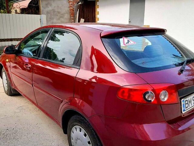 Красный Шевроле Лачетти, объемом двигателя 1.6 л и пробегом 236 тыс. км за 2900 $, фото 3 на Automoto.ua