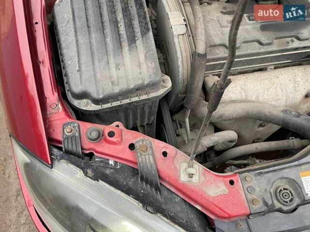 Красный Шевроле Лачетти, объемом двигателя 1.8 л и пробегом 121 тыс. км за 3750 $, фото 8 на Automoto.ua