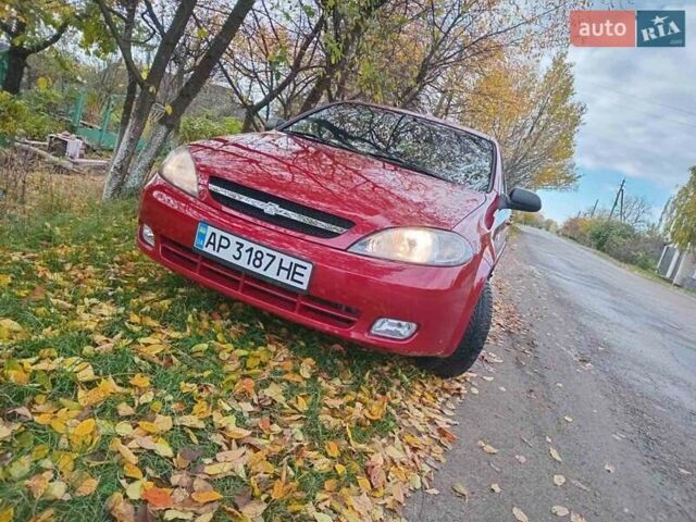 Красный Шевроле Лачетти, объемом двигателя 1.6 л и пробегом 141 тыс. км за 3399 $, фото 1 на Automoto.ua