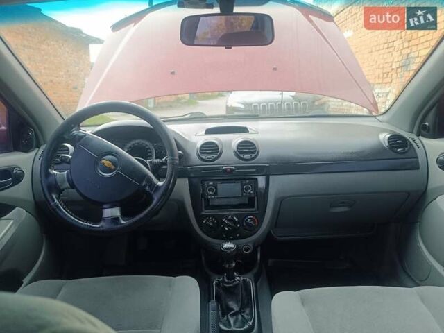 Красный Шевроле Лачетти, объемом двигателя 1.6 л и пробегом 261 тыс. км за 3650 $, фото 24 на Automoto.ua