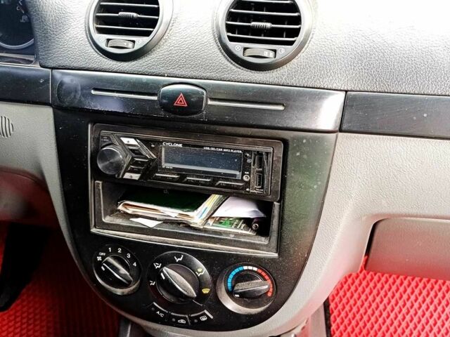 Красный Шевроле Лачетти, объемом двигателя 1.6 л и пробегом 264 тыс. км за 2500 $, фото 1 на Automoto.ua