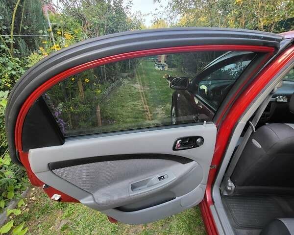 Красный Шевроле Лачетти, объемом двигателя 1.8 л и пробегом 110 тыс. км за 4600 $, фото 21 на Automoto.ua