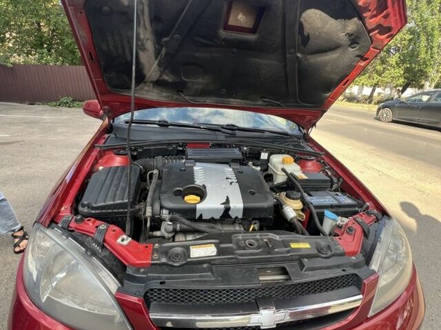 Красный Шевроле Лачетти, объемом двигателя 1.8 л и пробегом 250 тыс. км за 4000 $, фото 10 на Automoto.ua