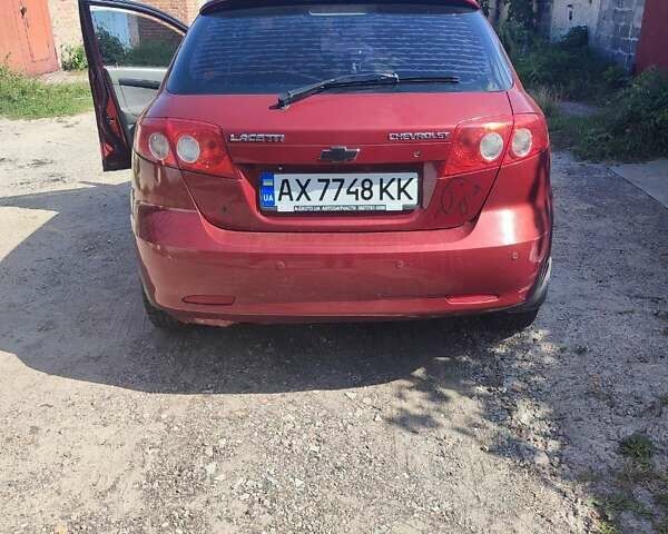 Красный Шевроле Лачетти, объемом двигателя 1.8 л и пробегом 202 тыс. км за 4400 $, фото 5 на Automoto.ua