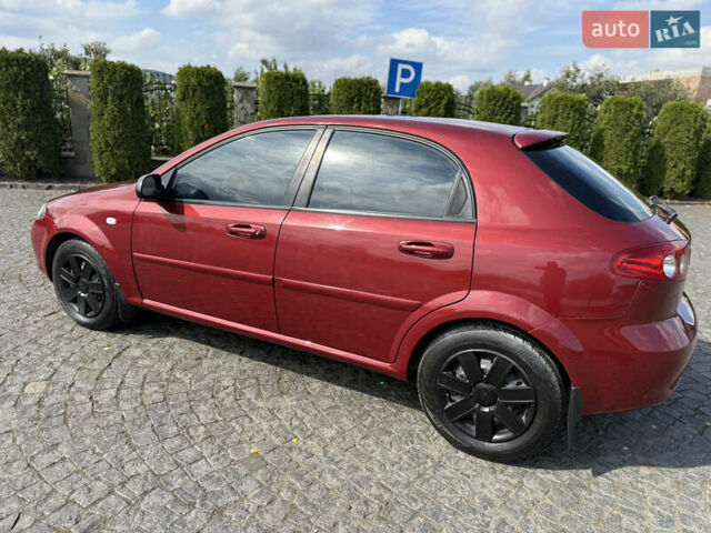 Красный Шевроле Лачетти, объемом двигателя 1.4 л и пробегом 258 тыс. км за 3300 $, фото 10 на Automoto.ua