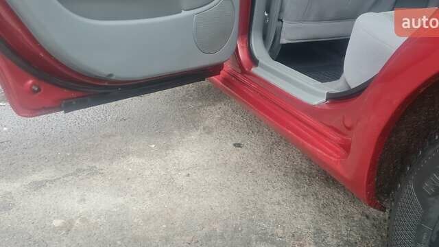 Красный Шевроле Лачетти, объемом двигателя 1.4 л и пробегом 259 тыс. км за 3500 $, фото 5 на Automoto.ua