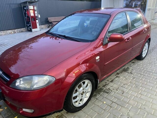 Красный Шевроле Лачетти, объемом двигателя 1.8 л и пробегом 250 тыс. км за 4000 $, фото 1 на Automoto.ua