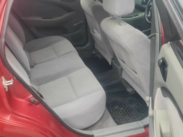 Красный Шевроле Лачетти, объемом двигателя 1.4 л и пробегом 259 тыс. км за 3500 $, фото 4 на Automoto.ua