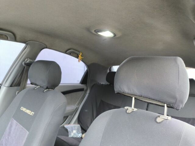 Красный Шевроле Лачетти, объемом двигателя 1.6 л и пробегом 300 тыс. км за 4200 $, фото 7 на Automoto.ua