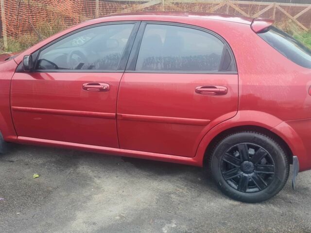 Красный Шевроле Лачетти, объемом двигателя 1.4 л и пробегом 259 тыс. км за 3500 $, фото 11 на Automoto.ua