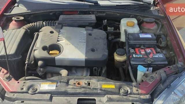 Красный Шевроле Лачетти, объемом двигателя 1.8 л и пробегом 202 тыс. км за 4400 $, фото 10 на Automoto.ua