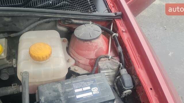 Красный Шевроле Лачетти, объемом двигателя 1.4 л и пробегом 259 тыс. км за 3500 $, фото 2 на Automoto.ua