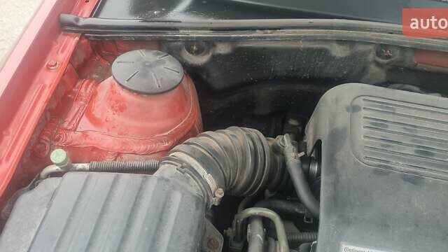 Красный Шевроле Лачетти, объемом двигателя 1.4 л и пробегом 259 тыс. км за 3500 $, фото 3 на Automoto.ua