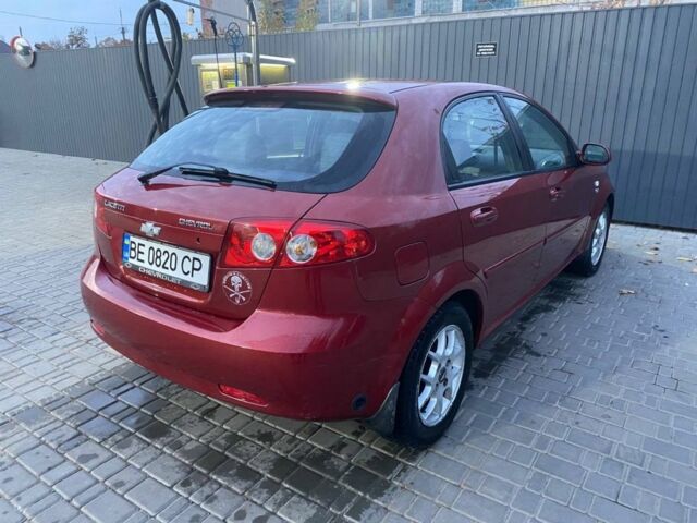 Красный Шевроле Лачетти, объемом двигателя 1.8 л и пробегом 250 тыс. км за 4000 $, фото 2 на Automoto.ua