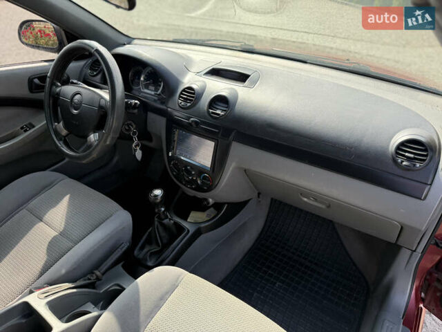 Красный Шевроле Лачетти, объемом двигателя 1.4 л и пробегом 258 тыс. км за 3300 $, фото 19 на Automoto.ua