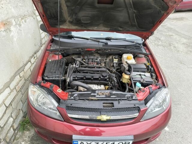 Красный Шевроле Лачетти, объемом двигателя 1.6 л и пробегом 300 тыс. км за 4200 $, фото 5 на Automoto.ua