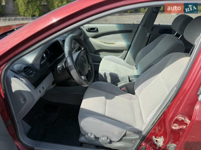 Красный Шевроле Лачетти, объемом двигателя 1.4 л и пробегом 258 тыс. км за 3300 $, фото 15 на Automoto.ua