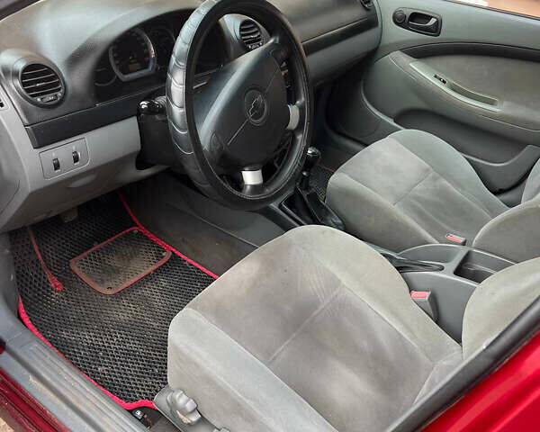 Красный Шевроле Лачетти, объемом двигателя 1.4 л и пробегом 200 тыс. км за 3200 $, фото 6 на Automoto.ua