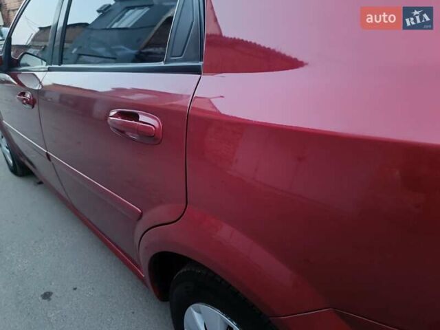 Красный Шевроле Лачетти, объемом двигателя 1.6 л и пробегом 261 тыс. км за 3650 $, фото 15 на Automoto.ua