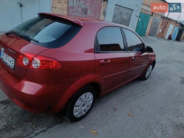 Красный Шевроле Лачетти, объемом двигателя 1.6 л и пробегом 261 тыс. км за 3650 $, фото 12 на Automoto.ua