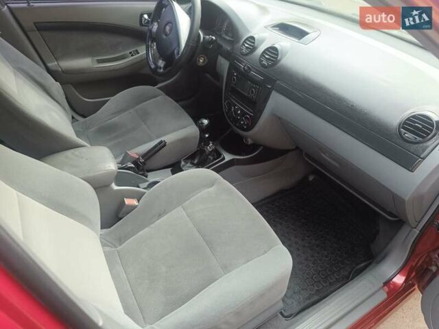 Красный Шевроле Лачетти, объемом двигателя 1.6 л и пробегом 261 тыс. км за 3650 $, фото 23 на Automoto.ua