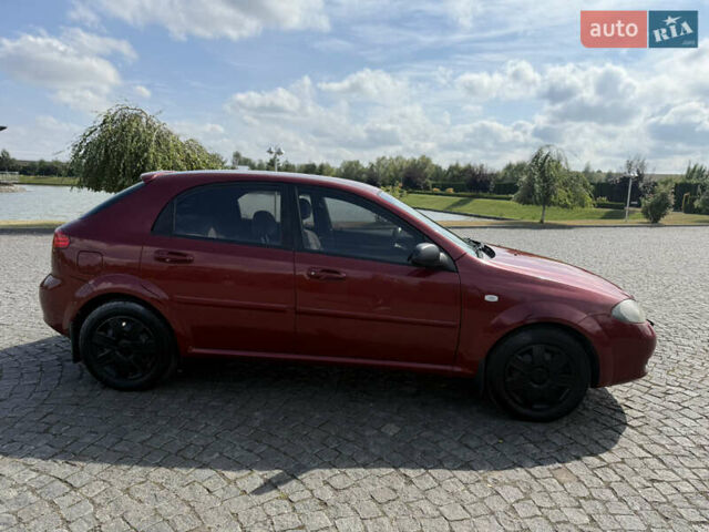 Красный Шевроле Лачетти, объемом двигателя 1.4 л и пробегом 258 тыс. км за 3300 $, фото 7 на Automoto.ua