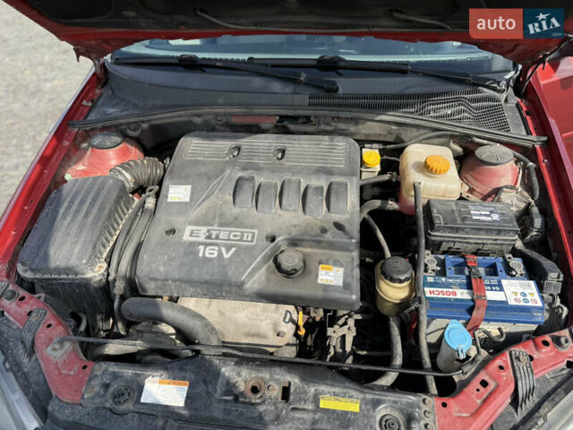 Красный Шевроле Лачетти, объемом двигателя 1.4 л и пробегом 258 тыс. км за 3300 $, фото 22 на Automoto.ua