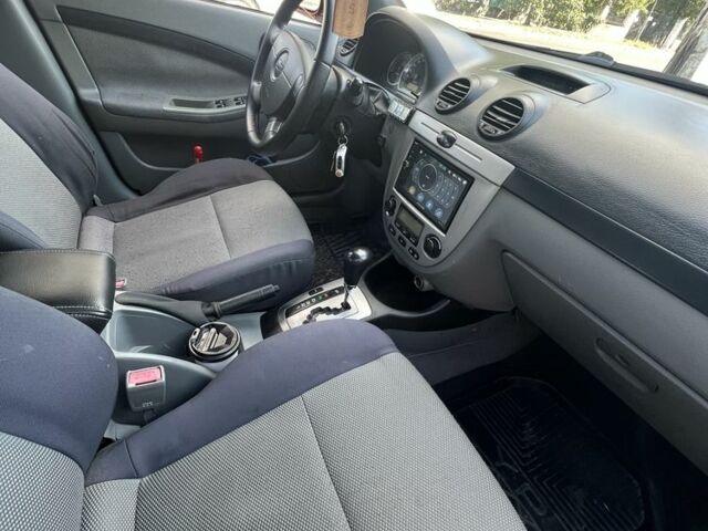 Красный Шевроле Лачетти, объемом двигателя 1.8 л и пробегом 250 тыс. км за 4000 $, фото 8 на Automoto.ua