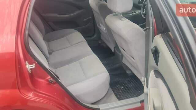 Красный Шевроле Лачетти, объемом двигателя 1.4 л и пробегом 259 тыс. км за 3500 $, фото 4 на Automoto.ua