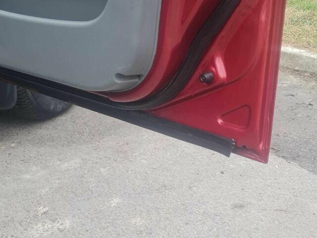 Красный Шевроле Лачетти, объемом двигателя 1.4 л и пробегом 259 тыс. км за 3500 $, фото 9 на Automoto.ua