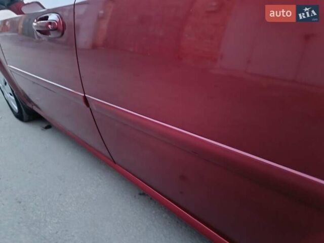 Красный Шевроле Лачетти, объемом двигателя 1.6 л и пробегом 261 тыс. км за 3650 $, фото 17 на Automoto.ua