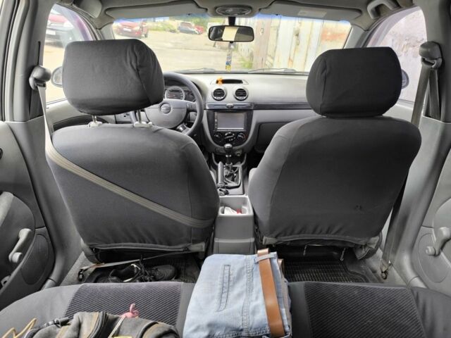 Красный Шевроле Лачетти, объемом двигателя 1.6 л и пробегом 300 тыс. км за 4200 $, фото 6 на Automoto.ua