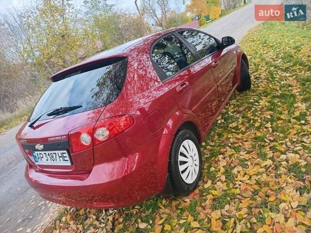 Красный Шевроле Лачетти, объемом двигателя 1.6 л и пробегом 141 тыс. км за 3399 $, фото 4 на Automoto.ua
