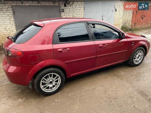 Красный Шевроле Лачетти, объемом двигателя 1.8 л и пробегом 121 тыс. км за 3750 $, фото 27 на Automoto.ua