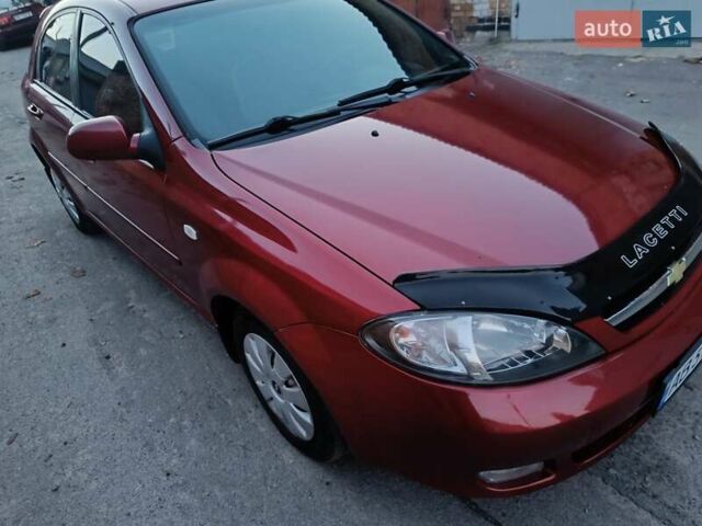 Красный Шевроле Лачетти, объемом двигателя 1.6 л и пробегом 261 тыс. км за 3650 $, фото 13 на Automoto.ua