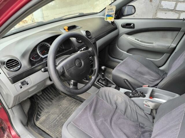 Красный Шевроле Лачетти, объемом двигателя 1.6 л и пробегом 300 тыс. км за 4200 $, фото 8 на Automoto.ua