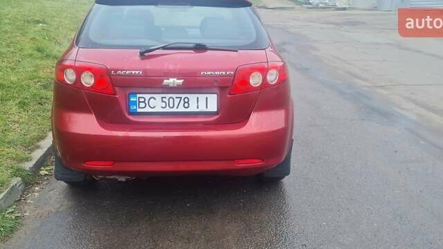 Красный Шевроле Лачетти, объемом двигателя 1.4 л и пробегом 259 тыс. км за 3500 $, фото 13 на Automoto.ua