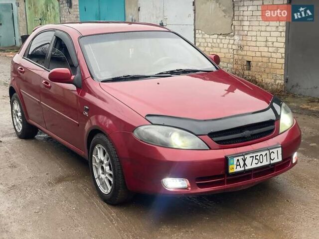 Красный Шевроле Лачетти, объемом двигателя 1.8 л и пробегом 121 тыс. км за 3750 $, фото 13 на Automoto.ua