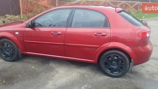 Красный Шевроле Лачетти, объемом двигателя 1.4 л и пробегом 259 тыс. км за 3500 $, фото 11 на Automoto.ua
