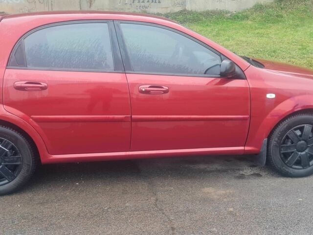 Красный Шевроле Лачетти, объемом двигателя 1.4 л и пробегом 259 тыс. км за 3500 $, фото 12 на Automoto.ua