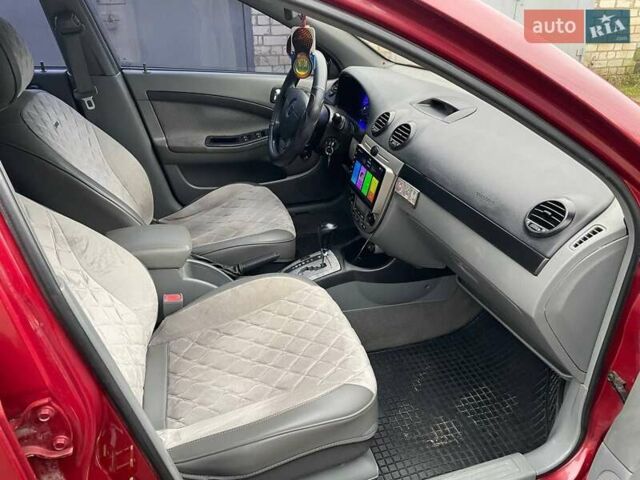 Красный Шевроле Лачетти, объемом двигателя 1.8 л и пробегом 121 тыс. км за 3750 $, фото 33 на Automoto.ua