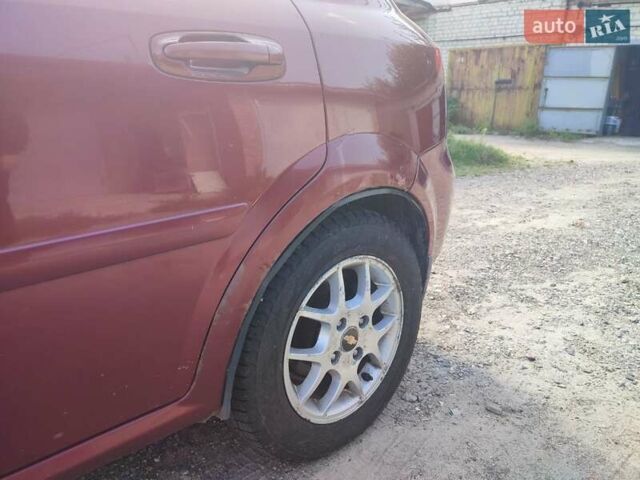 Красный Шевроле Лачетти, объемом двигателя 1.8 л и пробегом 202 тыс. км за 4400 $, фото 3 на Automoto.ua