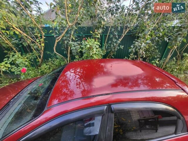 Красный Шевроле Лачетти, объемом двигателя 1.8 л и пробегом 110 тыс. км за 4600 $, фото 22 на Automoto.ua