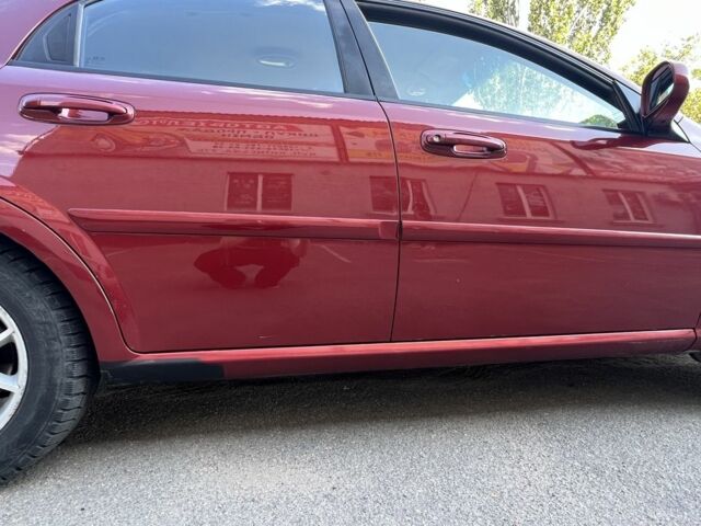 Красный Шевроле Лачетти, объемом двигателя 1.8 л и пробегом 250 тыс. км за 4000 $, фото 3 на Automoto.ua