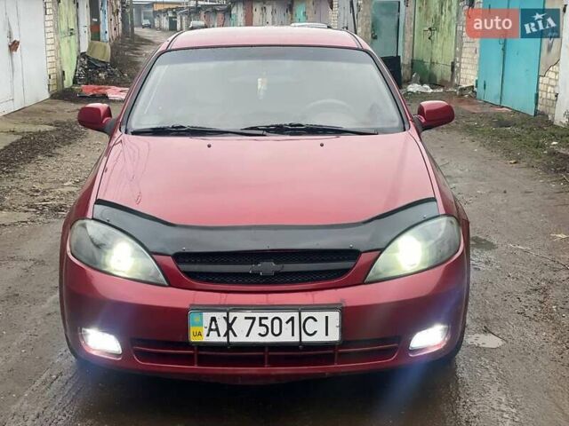 Красный Шевроле Лачетти, объемом двигателя 1.8 л и пробегом 121 тыс. км за 3750 $, фото 15 на Automoto.ua