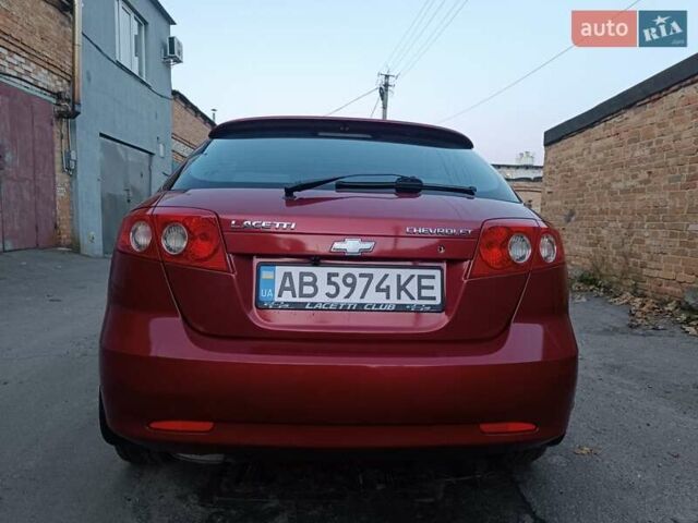 Красный Шевроле Лачетти, объемом двигателя 1.6 л и пробегом 261 тыс. км за 3650 $, фото 2 на Automoto.ua