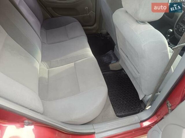 Красный Шевроле Лачетти, объемом двигателя 1.6 л и пробегом 261 тыс. км за 3650 $, фото 22 на Automoto.ua