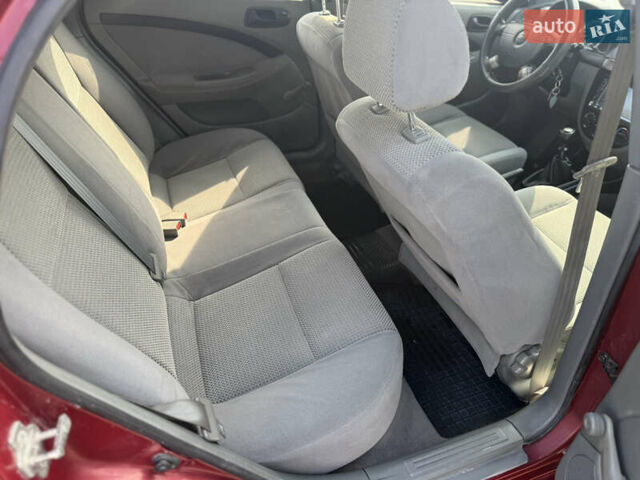 Красный Шевроле Лачетти, объемом двигателя 1.4 л и пробегом 258 тыс. км за 3300 $, фото 18 на Automoto.ua